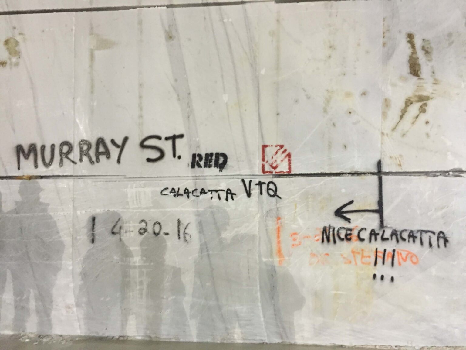 Large piece of white marble with light gray veining labeled Murray St with a note saying Nice Calacatta!!!